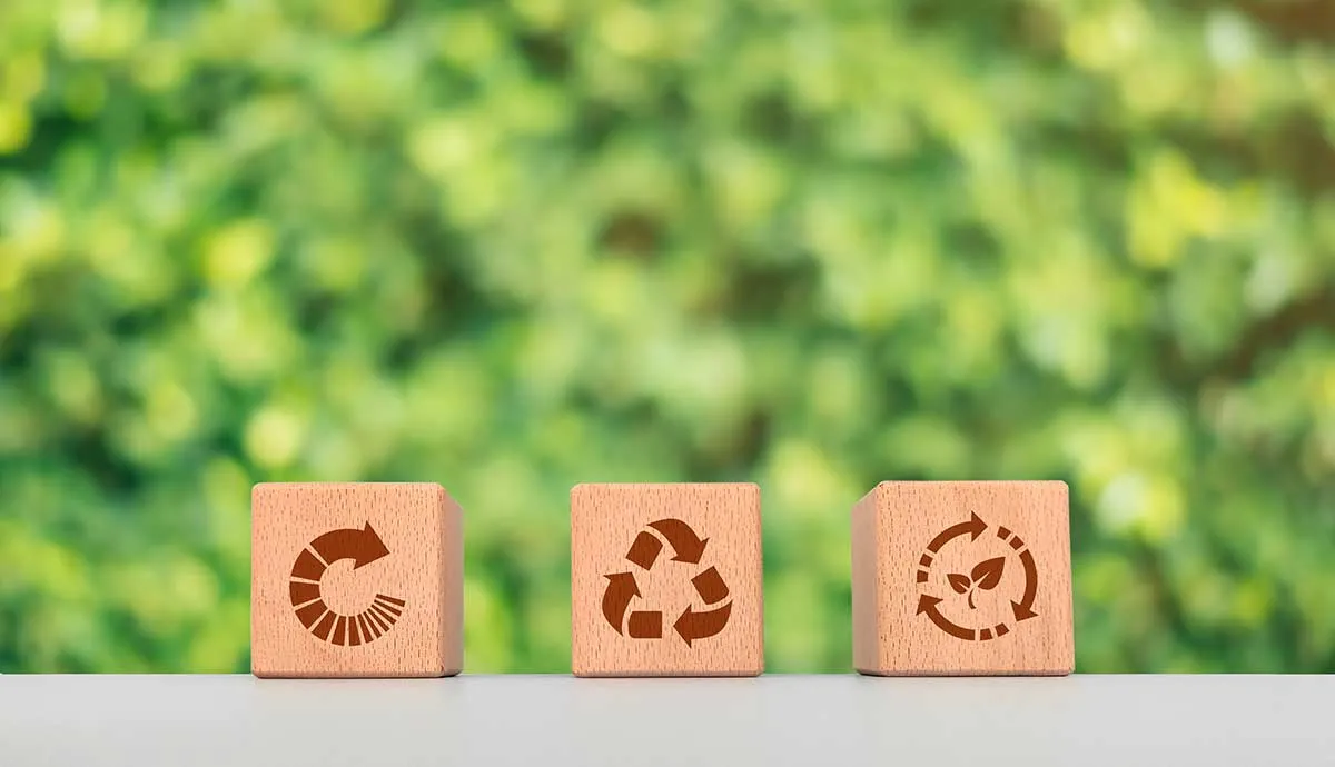 Environment and recycling concept, wooden cube blocks with recycling symbol