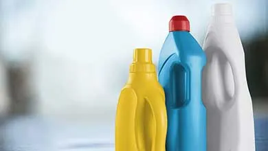 row of three laundry bottles